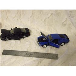 2 Model Cars( 1999 Mustang Cobra, 1970 Boss 302 Mustang)