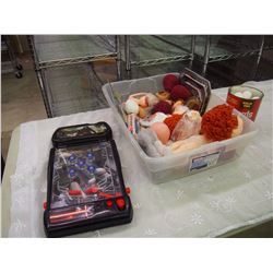 Tub Full Of Doll Parts And Pinball Machine