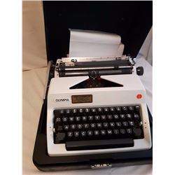 Olympia Portable Typewriter With Case
