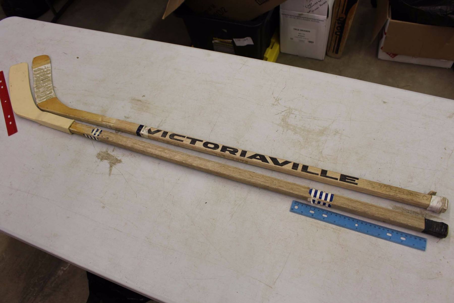 Two Vintage Wooden Hockey Sticks