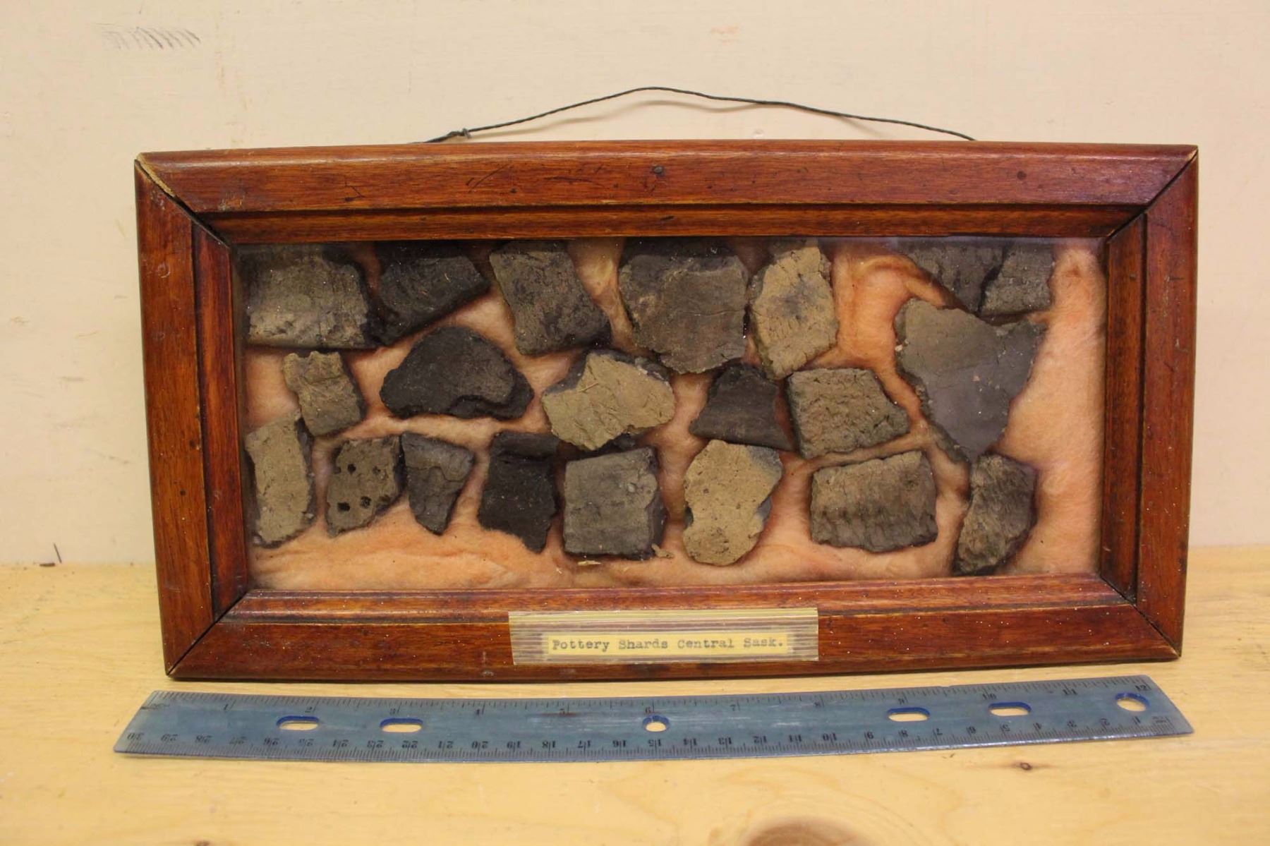 Pottery Shards In Display Case (Central Sask)