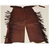 Image 1 : Fringed leather chaps with back of waist belt  area inscribed “T. Mix/Hollywood”; in  overall good t