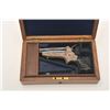 Image 2 : Tipping & Lawden Sharps four barrel  derringer, finely and extensively scroll  engraved, blued finis