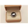 Image 1 : Exceptionally large 28.26 carats round  'Black' Diamond set in a 14 karat white gold  ladies ring su