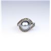 Image 3 : Exquisite ring featuring a center black South  Sea Pearl averaging 10.00 MM in diameter of  nice col