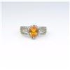 Image 1 : Nice Fire Opal and diamond ring with over 60  round diamonds in a 10 karat yellow gold  setting. Est