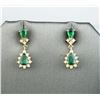 Image 1 : Gorgeous ladies drop earrings set with four  intense green emeralds weighing approx. 1.50  carats an