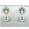 Image 2 : Gorgeous ladies drop earrings set with four  intense green emeralds weighing approx. 1.50  carats an
