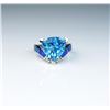 Image 2 : Gorgeous ladies ring set with a fine  Trilliant cut blue Topaz and black Opal inlay  with side diamo