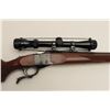 Image 3 : Ruger No. 1 single shot rifle, .220 Swift  caliber, 26” round barrel, blued finish,  checkered wood 