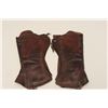 Image 4 : Pair of old leather gaiters.    Est.:   $50-$100.