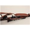 Image 13 : Remington Model 700 bolt action rifle,  .22-250 caliber, 25” barrel, mat black  finish, checkered wo