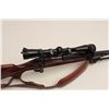 Image 8 : Remington Model 700 bolt action rifle,  .22-250 caliber, 25” barrel, mat black  finish, checkered wo