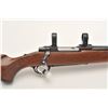 Image 8 : Ruger M77 bolt action rifle, .243 Win  caliber, 24” round barrel, blued finish,  checkered wood stoc