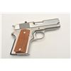 Image 1 : Detonics MK VI semi-automatic pistol, .45  caliber, 3.5” barrel, stainless, checkered  wood grips, S