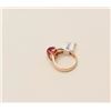 Image 2 : One 18k rose gold ladies ring set with a  Burmese ruby cabochon weighing approx 5 ct   and 2 side di