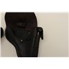 Image 10 : Two leather flap holsters for Luger  semi-automatic pistols, one black, one brown.        Est.:  $20