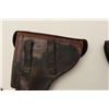 Image 11 : Two leather flap holsters for Luger  semi-automatic pistols, one black, one brown.        Est.:  $20