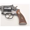 Image 1 : Smith & Wesson K-22 DA revolver, .22LR  caliber, 4” barrel, blued finish, checkered  wood medallion 