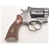 Image 4 : Smith & Wesson K-22 DA revolver, .22LR  caliber, 4” barrel, blued finish, checkered  wood medallion 