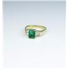 Image 2 : Amazing ladies ring featuring a fine   Colombian Emerald weighing over 1.02 carat  and side tapered 