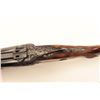 Image 4 : High relief engraved deluxe drilling rifle,  20 gauge SxS over 6.5x58RHO mm caliber, 23.5”  barrel, 