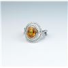Image 3 : Stunning ladies ring featuring a Mandarin  Orange sapphire weighing approx. 3.00 carats  and micro s