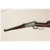 Image 10 : Winchester Model 94 lever action carbine,  .25-35 W.C.F. caliber, 20” barrel, blued  finish, wood st