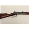 Image 5 : Winchester Model 94 lever action carbine,  .25-35 W.C.F. caliber, 20” barrel, blued  finish, wood st