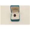 Image 1 : One unique rose gold ring set with a cabochon  blood stone. EST.$300-400