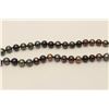Image 4 : One fine quality strand of black pearls  23inches long and of 9mm in diameter (14k  white gold clasp