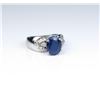 Image 2 : Nice ladies ring featuring an oval Sapphire  weighing approx. 4.00 carats and 8 side  diamonds set i