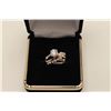 Image 1 : Approx. 1.03 ct Center Diamond estimated F-G  color and V-S clarity, mounted in 18k with 8  small si
