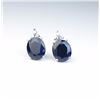 Image 3 : Elegant earrings featuring two matching oval  blue Sapphires weighing 8.50 carats and six  side acce