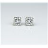 Image 1 : Spectacular ladies earrings featuring two  fine matching Princess cut diamonds weighing  1.42 carats
