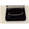 Image 2 : One tennis bracelet in 14 k white gold set  with approx 3ct of fine quality full cut  diamonds. EST.