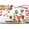 Image 5 : Lot of U.S. military medals and insignias in  large riker case.       Est.:  $50-100