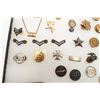Image 6 : Lot of U.S. military medals and insignias in  large riker case.       Est.:  $50-100
