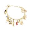 Image 1 : 14KT Yellow Gold Charm Bracelet with 14 Attached Charms