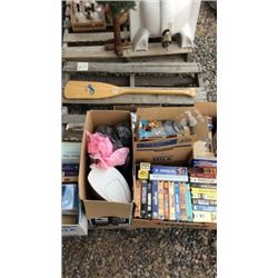 Pallet of books, VHS tapes, and an oar