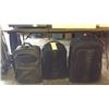 3 "Tumi" suitcases