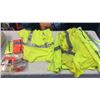 Image 1 : Lot of reflective safety vests, shirts, and hard