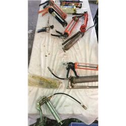 Lot of caulking guns and grease guns ( concrete,