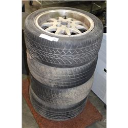 SET OF FOUR HANKOOK 15  TIRES ON FOUR BOLT RIMS