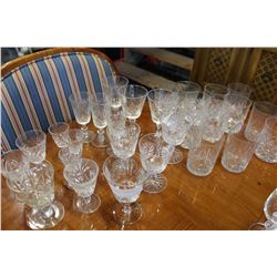 SHELF LOT OF CRYSTAL STEMWARE AND HIGHBALL GLASSES