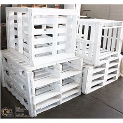 LARGE STACK OF WOOD PALLETS WITH PAINTED WHITE