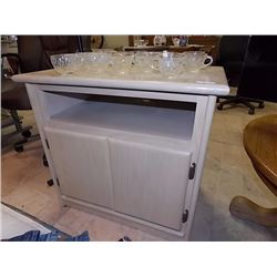 BLOND OAK CABINET - 2 DOOR - ON WHEELS