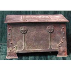 An English Arts and Crafts hammered copper rectangular box, the hinged lid inscribed "Fast Bind S...