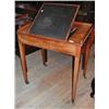 Image 1 : A good 19th century mahogany writing table with adjustable hinged lined writing surface and inkwe...