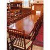 Image 1 : An enormous solid oak extending refectory table with set of sixteen rush seated spindle back dini...